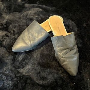 Lucky Brand | Black Mules with cute snake skin details on edge- size 9.5